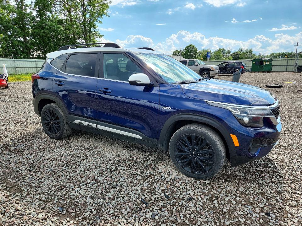 2023 Kia Seltos VIN KNDEUCA20P7371060 COPART salvage auction — HAIL, Salvage Title, sold $8,800 on 2026-08-17 (photo 4)