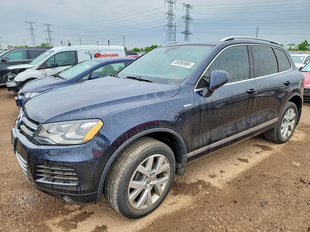 2014 Volkswagen Touareg VIN WVGEP9BP4ED011787 COPART salvage auction — Normal Wear, NJ - CERTIFICATE OF TITLE, sold $900 on 2026-07-02 (photo 1)