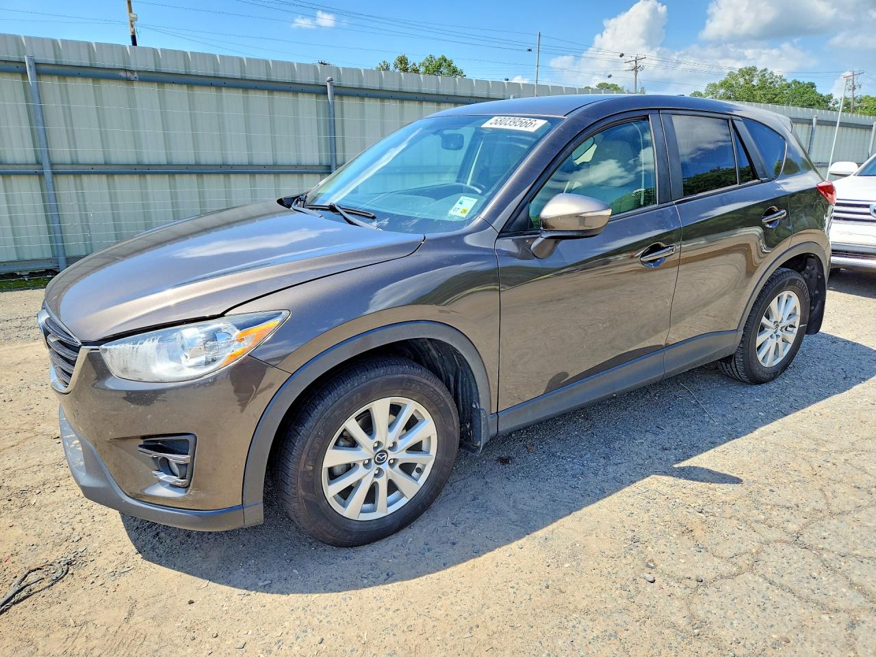 2016 Mazda CX-5 VIN JM3KE2CYXG0886479 COPART salvage auction — Water/Flood, LA - CERT OF TITLE-SALVAGE FLOOD, sold $2,100 on 2026-07-09 (photo 1)