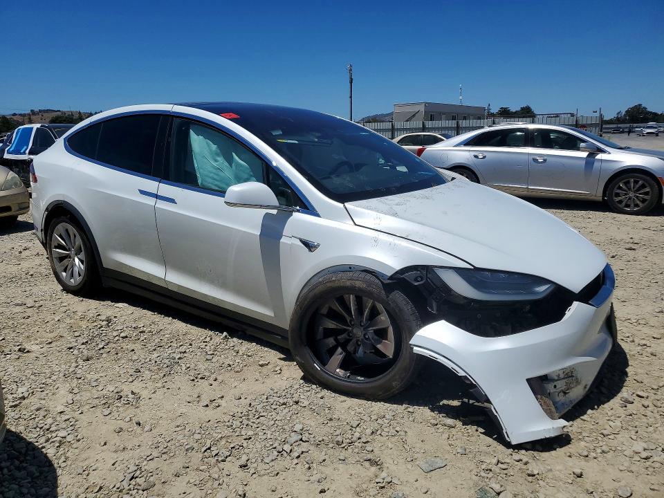 2018 Tesla Model x VIN 5YJXCBE28JF101270 COPART salvage auction — SIDE, Ca - Salvage Certificate, sold $3,250 on 2026-07-02 (photo 4)