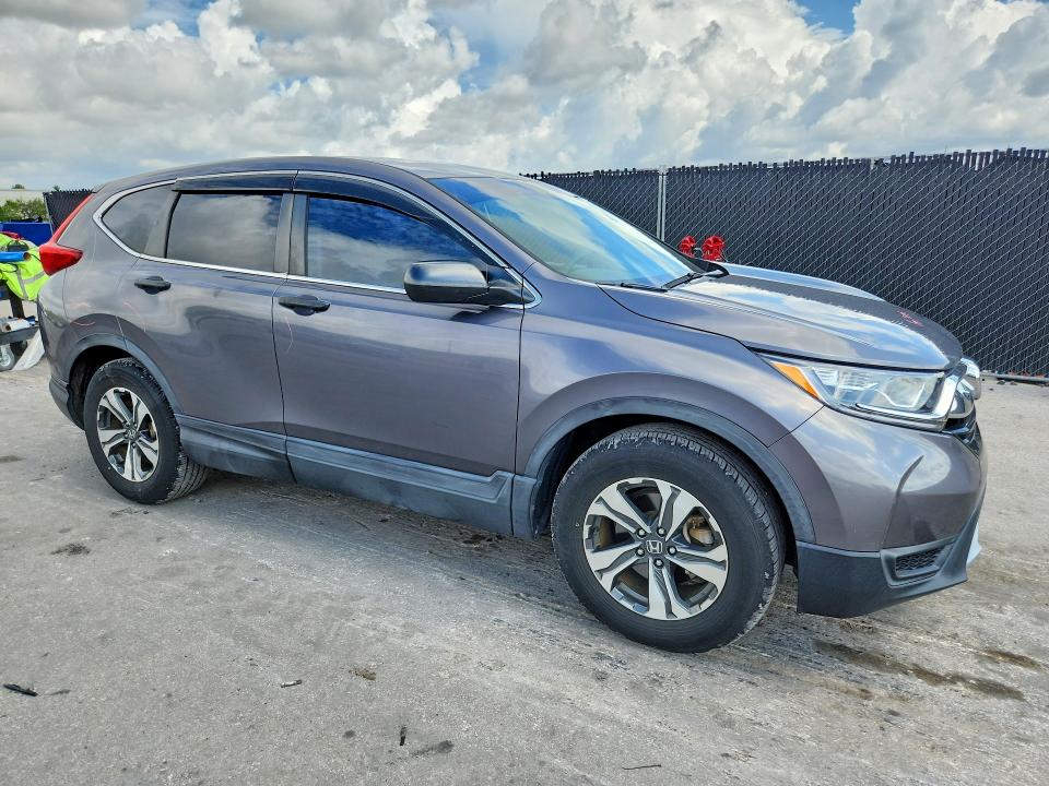 2018 Honda Cr-v VIN 2HKRW5H33JH405906 COPART salvage auction — MINOR DENT/SCRATCHES, Fl - Cert Of Title Slvg Rebuildable, sold $9,100 on 2026-07-02 (photo 4)