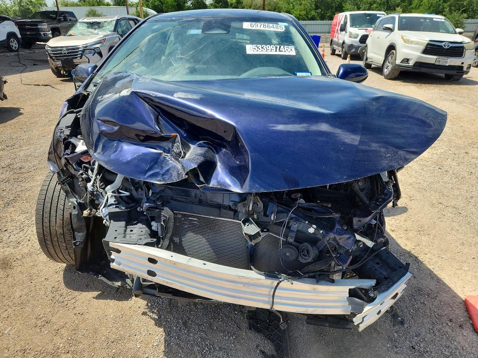 2023 Toyota Corolla VIN JTDBCMFE7PJ011883 COPART salvage auction — FRONT END, Tx - Nonrepairable Title, sold $100 on 2026-07-09 (photo 5)