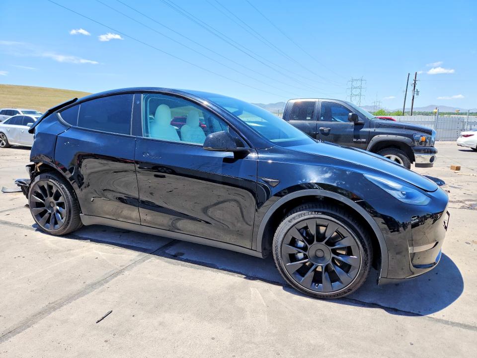 2021 Tesla Model y VIN 5YJYGAEE3MF152175 COPART salvage auction — REAR END, Co - Public - Salvage Title, sold $7,900 on 2026-07-27 (photo 4)
