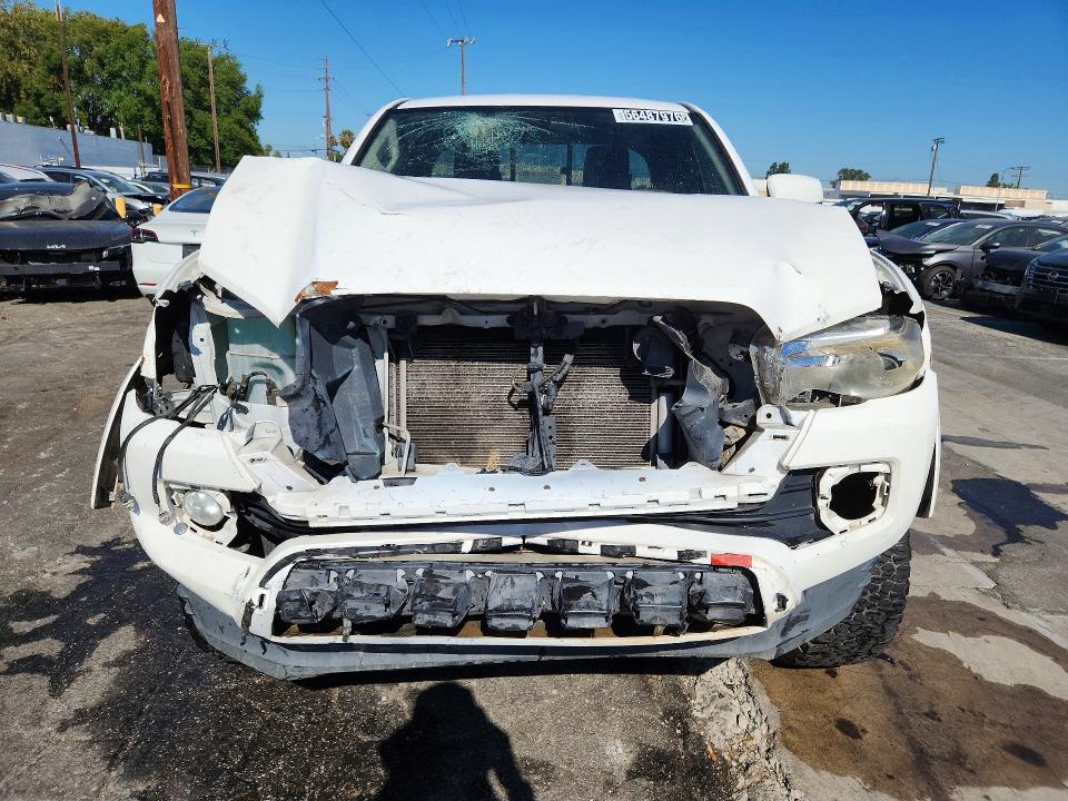 2016 Toyota Tacoma VIN 5TFRX5GN7GX058058 COPART salvage auction — FRONT END, CA - CERTIFICATE OF TITLE, sold $2,450 on 2026-07-09 (photo 5)