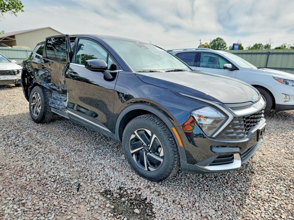 2023 Kia Sportage VIN KNDPUCAG6P7075318 COPART salvage auction — SIDE, Ny - Mv-907A Salvage Certificate, sold $7,300 on 2026-07-20 (photo 4)