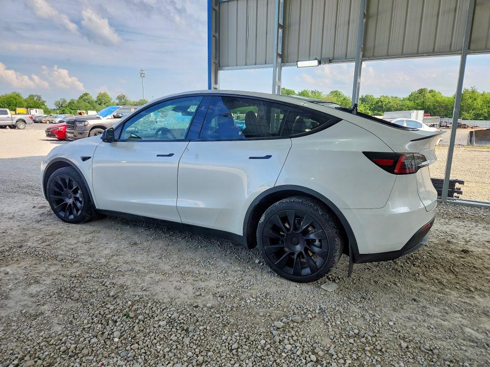 2023 Tesla Model y VIN 7SAYGDEE3PA207780 COPART salvage auction — HAIL, MO - SALVAGE CERTIFICATE OF TITLE, sold $12,800 on 2026-07-27 (photo 2)