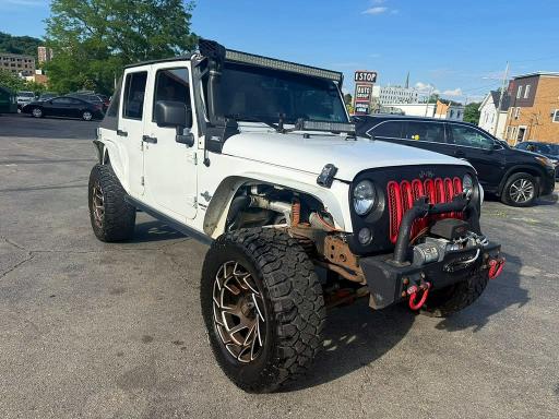 2014 Jeep Wrangler / VIN 1C4BJWDG7EL203909 COPART salvage auction — MINOR DENT/SCRATCHES, In - Certificate Of Title (P), sold $10,700 on 2026-07-29 (photo 4)