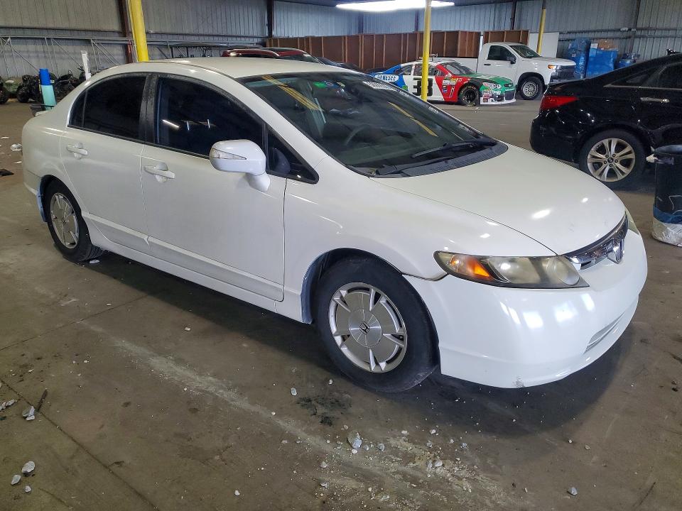 2010 Honda Civic hybrid VIN JHMFA3F22AS007411 COPART salvage auction — MECHANICAL, Fl - Cert Of Title Slvg Rebuildable, sold $400 on 2026-07-13 (photo 4)