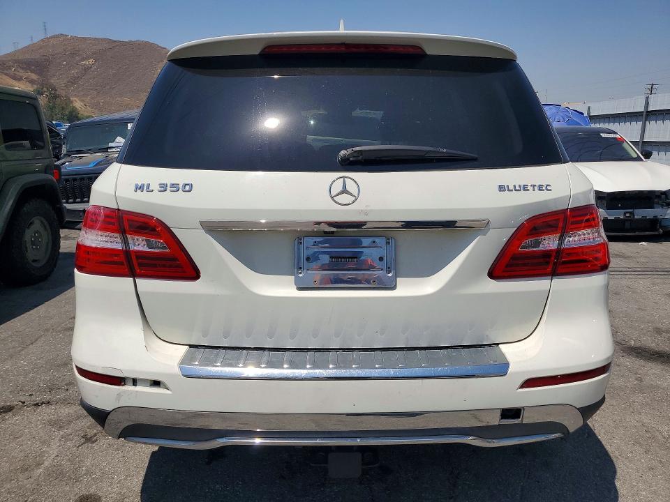 2012 Mercedes-benz M-klasse VIN 4JGDA2EB6CA011566 COPART salvage auction — MINOR DENT/SCRATCHES, Ca - Dis/Dlr/Exp Only Clean Title, sold $2,050 on 2026-07-09 (photo 6)