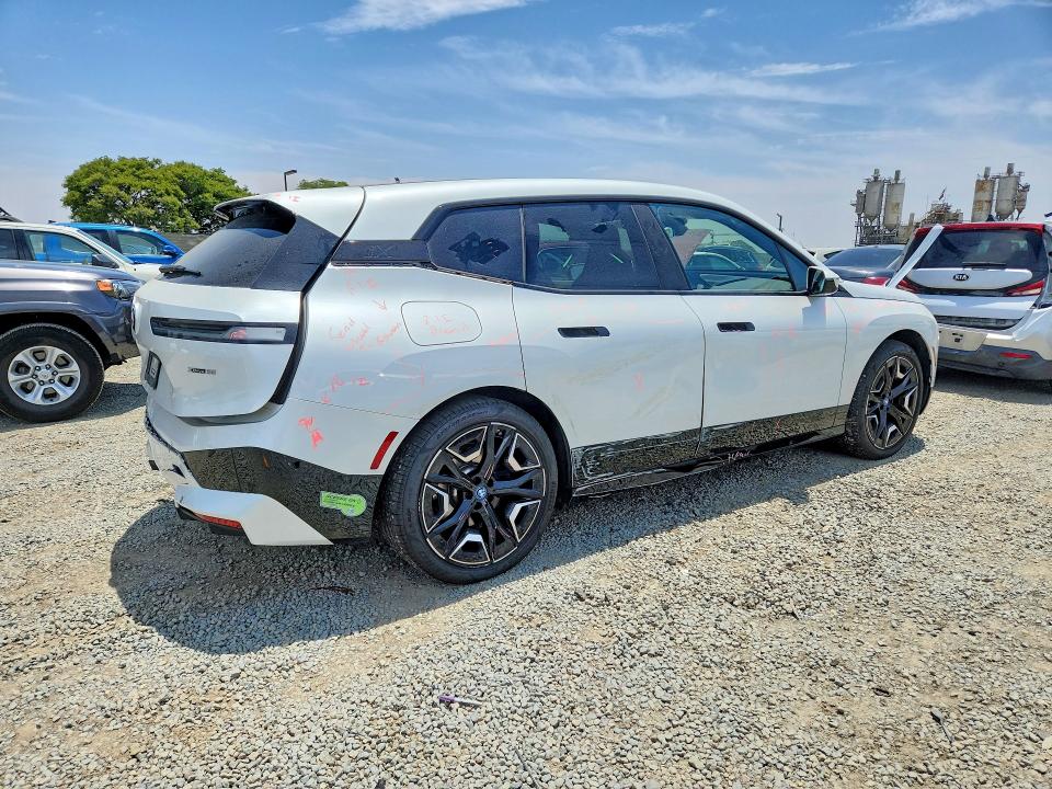 2023 BMW Ix VIN WB523CF00PCM58408 COPART salvage auction — SIDE, Ca - Salvage Certificate, sold $4,000 on 2026-07-21 (photo 3)