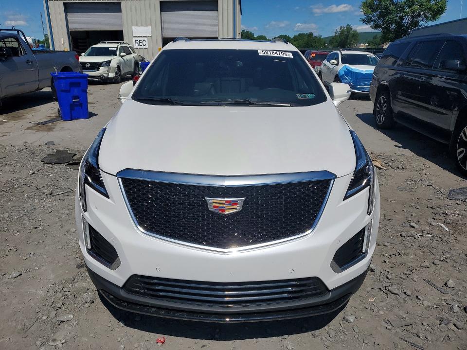 2022 Cadillac VIN 1GYKNGRS8NZ148885 COPART salvage auction — SIDE, Pa - Certificate Of Salvage, sold $11,000 on 2026-07-15 (photo 5)