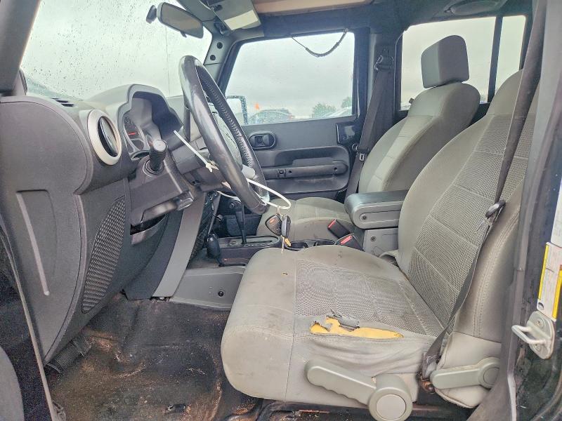 2009 Jeep Wrangler unlimited VIN 1J4GA59129L751093 COPART salvage auction — ENGINE BURN, Mi - Certificate Of Title, sold $725 on 2026-07-09 (photo 7)