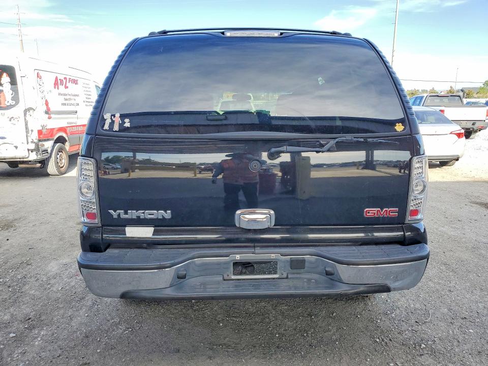 2003 Gmc Yukon VIN 1GKEC13V63R184469 COPART salvage auction — REAR END, FL - CERT OF TITLE SLVG REBUILDABLE, sold $400 on 2026-07-10 (photo 6)