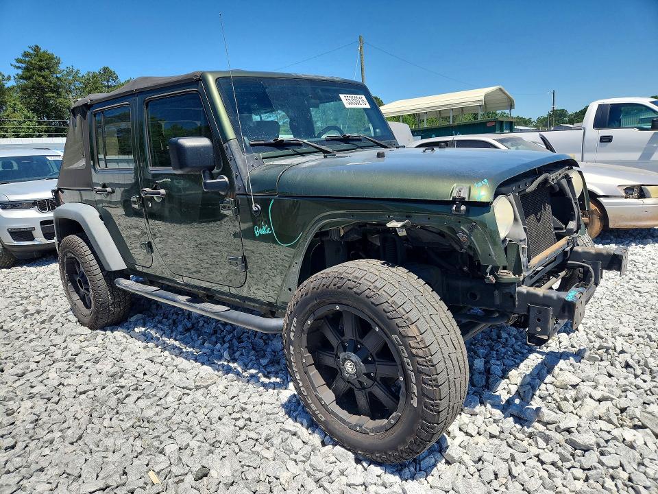 2009 Jeep Wrangler / VIN 1J4GB39179L753990 COPART salvage auction — FRONT END, GA - CERT OF TITLE-SALVAGE, sold $1,500 on 2026-08-02 (photo 4)