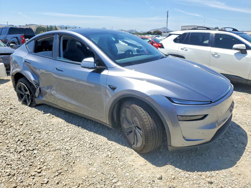 2026 Tesla Model y VIN 7SAYGDEEXTF460740 COPART salvage auction — SIDE, Ca - Salvage Certificate, sold $8,500 on 2026-07-21 (photo 4)
