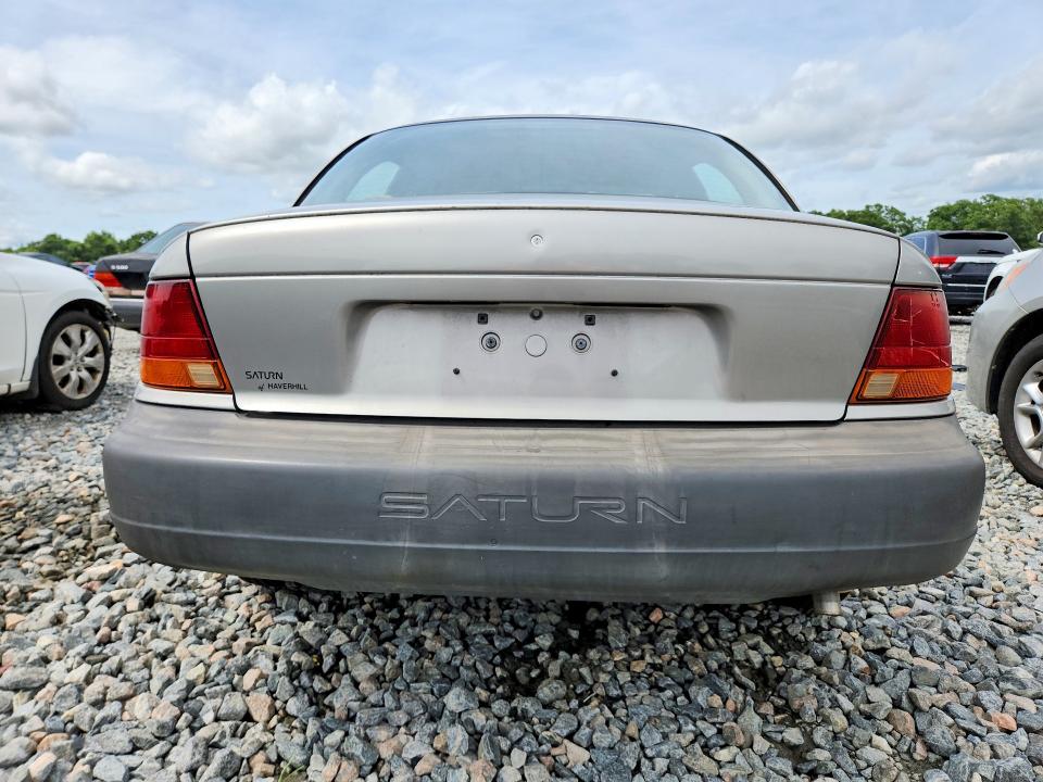 1997 Saturn Sl1 VIN 1G8ZH5282VZ180367 COPART salvage auction — UNDERCARRIAGE, Ga - Certificate Of Title, sold $350 on 2026-07-02 (photo 6)