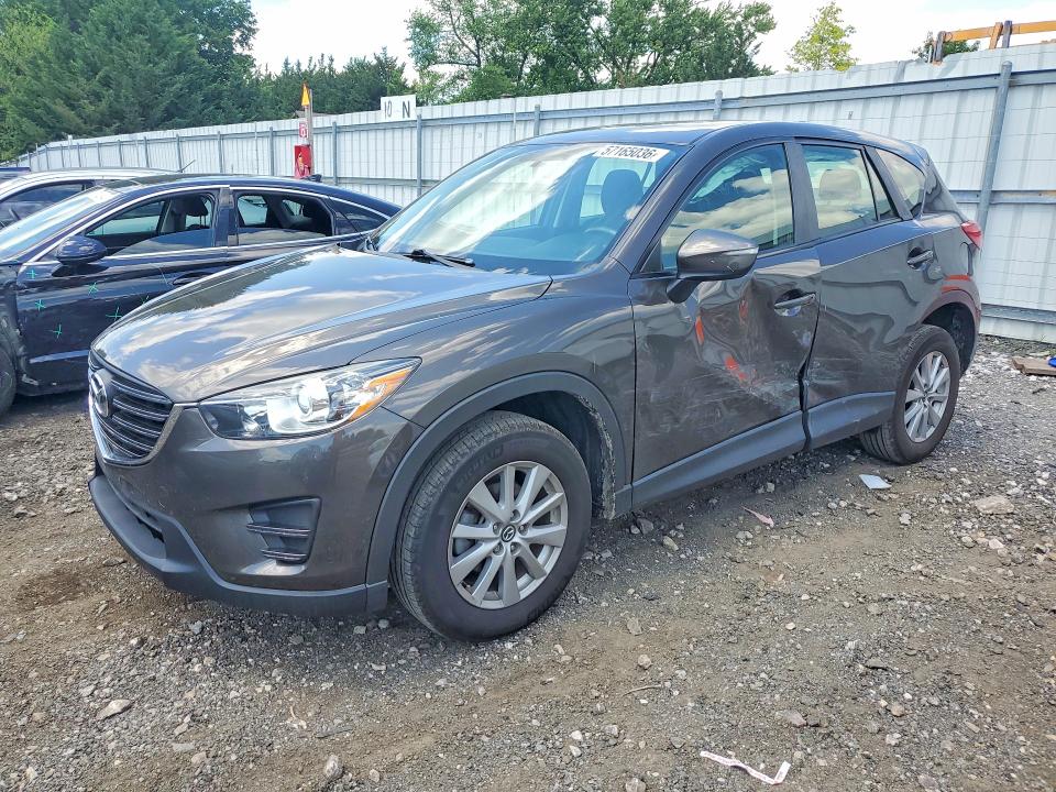 2016 Mazda VIN JM3KE4BY1G0751680 COPART salvage auction — SIDE, Md - Cert Of Salvage > 75% Damage, sold $2,000 on 2026-07-27 (photo 1)