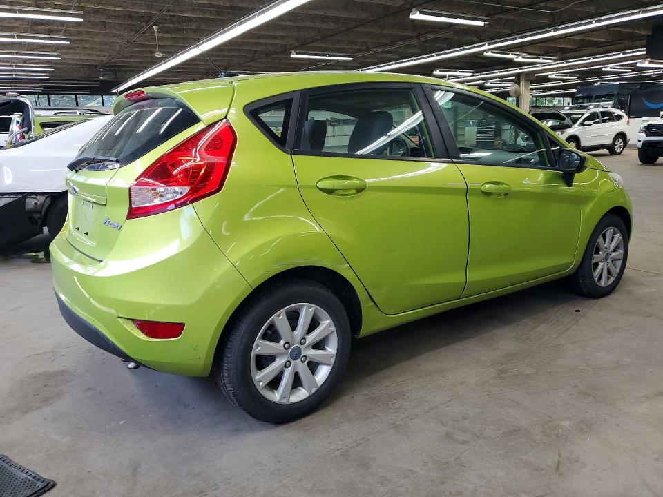 2012 Ford Fiesta VIN 3FADP4EJ9CM101860 COPART salvage auction — MINOR DENT/SCRATCHES, Il - Certificate Of Title, sold $325 on 2026-07-09 (photo 3)