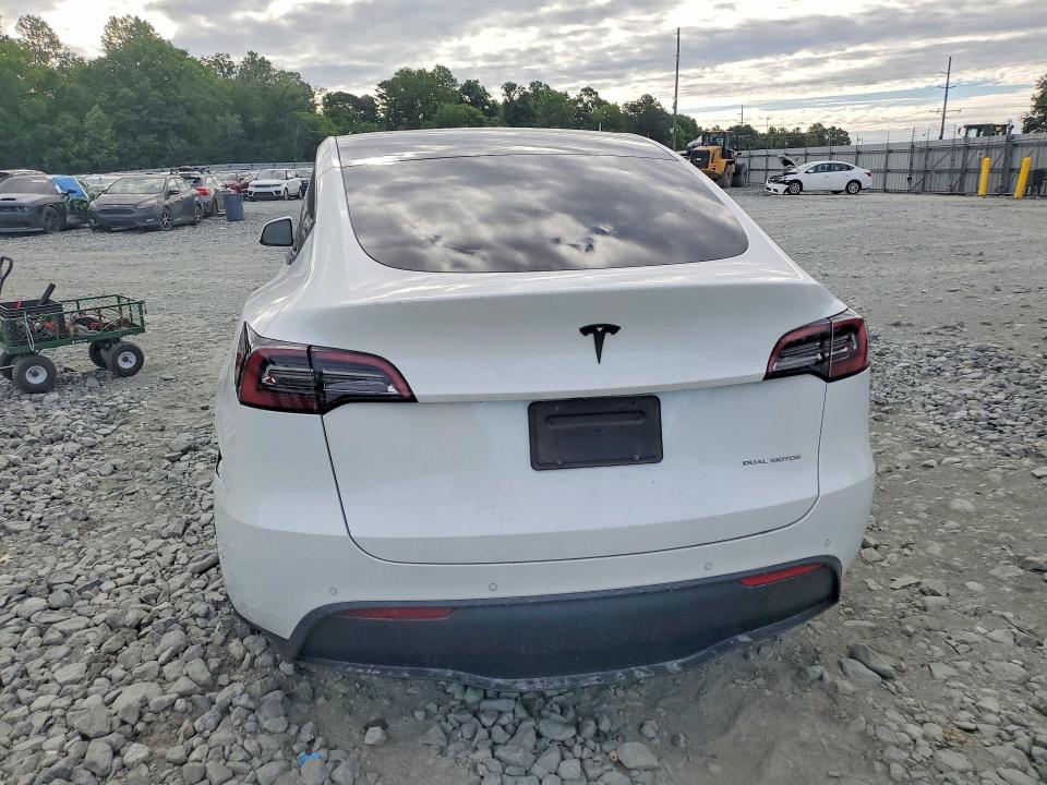 2021 Tesla Model y VIN 5YJYGAEE1MF195414 COPART salvage auction — SIDE, Nc - Salvage Certificate Of Title, sold $5,100 on 2026-07-22 (photo 6)