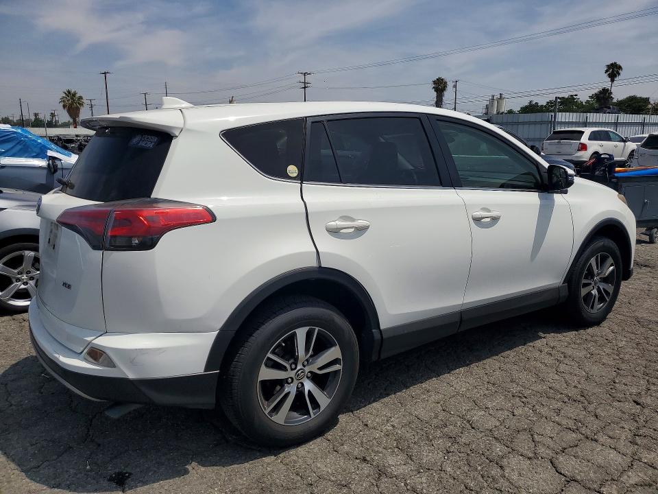 2018 Toyota Rav 4 VIN JTMWFREV1JJ730819 COPART salvage auction — MINOR DENT/SCRATCHES, Ca - Salvage Certificate, sold $7,700 on 2026-07-02 (photo 4)