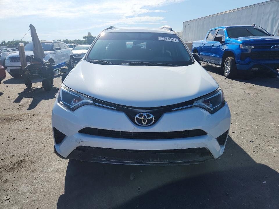 2016 Toyota Rav 4 VIN JTMZFREV6GJ094856 COPART salvage auction — ROLLOVER, Fl - Certificate Of Title, sold $2,450 on 2026-07-27 (photo 5)