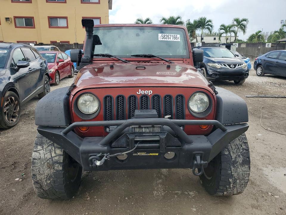 2010 Jeep Wrangler / VIN 1J4AA2D16AL119780 COPART salvage auction — MINOR DENT/SCRATCHES, Fl - Certificate Of Title (P), sold $4,700 on 2026-07-09 (photo 5)