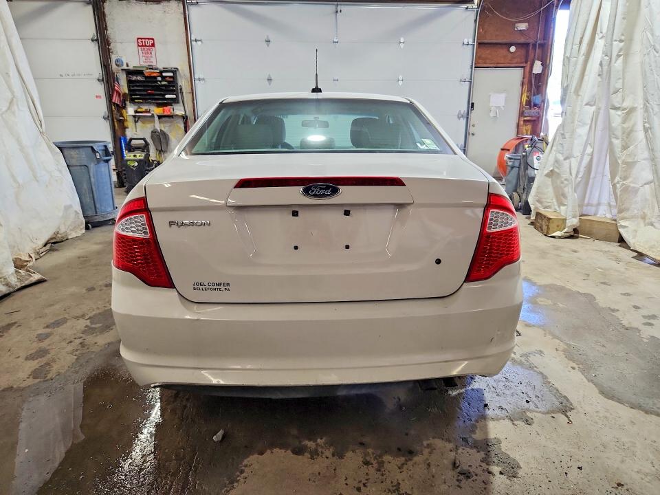 2012 Ford VIN 3FAHP0GA5CR142710 COPART salvage auction — NORMAL WEAR, Pa - Cert Of Title, sold $550 on 2026-07-30 (photo 6)