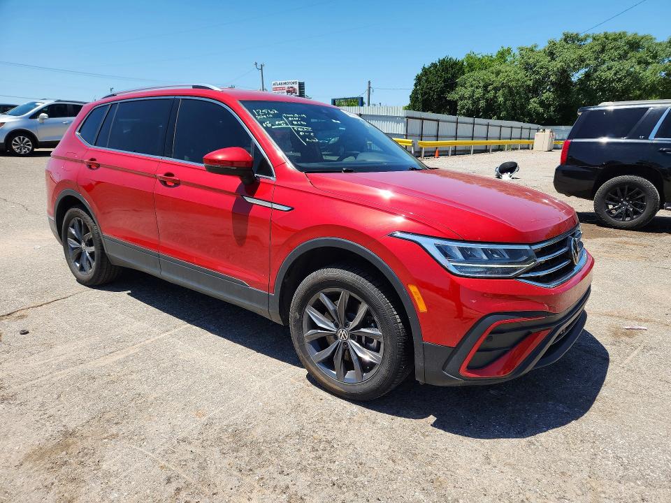 2023 Volkswagen Tiguan VIN 3VV3B7AX4PM036195 COPART salvage auction — SIDE, Ok - Cert Of Title-Salvage, sold $7,400 on 2026-07-30 (photo 4)