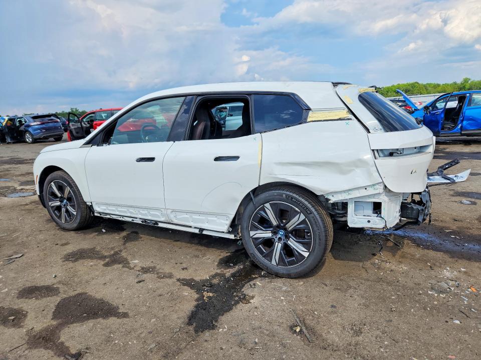 2024 BMW Ix VIN WB523CF0XRCN55473 COPART salvage auction — SIDE, Va - Cert Of Title - Salvage, sold $20,900 on 2026-07-15 (photo 2)