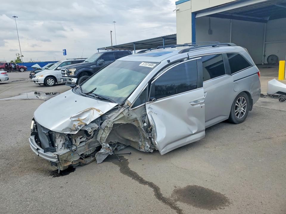 2012 Honda Odyssey VIN 5FNRL5H63CB059411 COPART salvage auction — FRONT END, NM - CERT OF TITLE-SALVAGE, sold $875 on 2026-07-24 (photo 1)