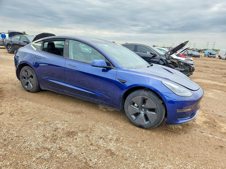 2023 Tesla Model 3 VIN 5YJ3E1EA7PF680318 COPART salvage auction — REAR END, Il - Salvage Certificate, sold $8,700 on 2026-07-07 (photo 4)