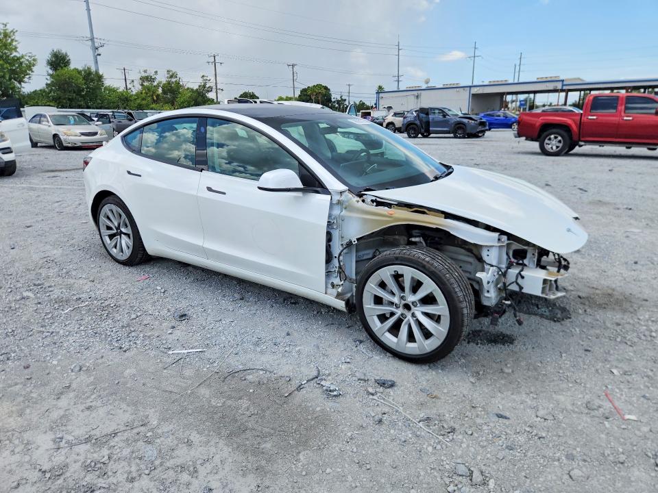 2021 Tesla VIN 5YJ3E1EA2MF053358 COPART salvage auction — FRONT END, FL - CERT OF TITLE SLVG REBUILDABLE, sold $1,450 on 2026-07-24 (photo 4)