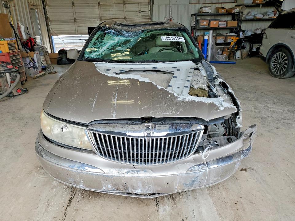2001 Lincoln Continental VIN 1LNHM97V01Y720555 COPART salvage auction — FRONT END, TX - SALVAGE VEHICLE TITLE, sold $275 on 2026-07-17 (photo 5)