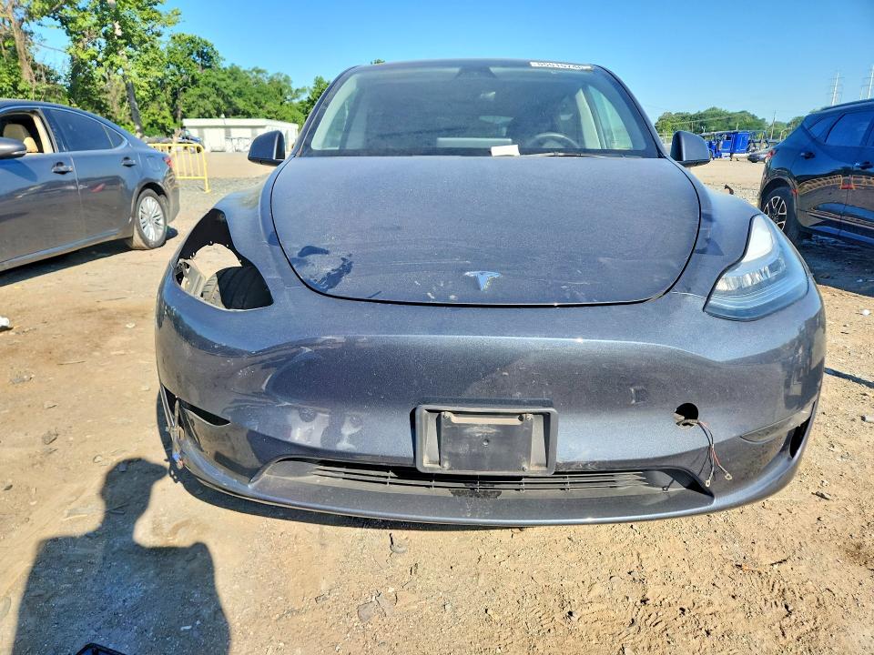 2023 Tesla Model y VIN 7SAYGDEE9PA034654 COPART salvage auction — SIDE, MD - CERT OF SALVAGE < 75% DAMAGE, sold $11,600 on 2026-07-07 (photo 5)