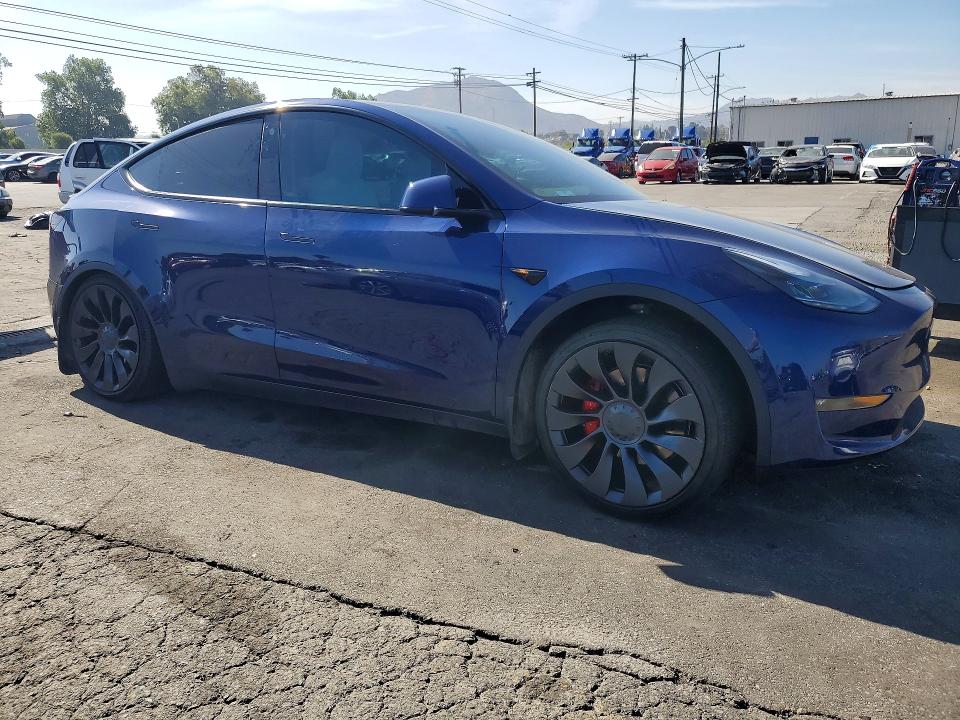 2022 Tesla Model y VIN 7SAYGDEF3NF489461 COPART salvage auction — SIDE, Ca - Salvage Certificate, sold $6,600 on 2026-07-02 (photo 4)