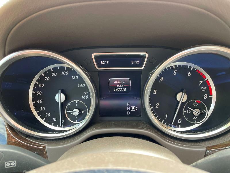 2015 Mercedes-benz Gl-klasse VIN 4JGDF6EE5FA598124 COPART salvage auction — MINOR DENT/SCRATCHES, Fl - Certificate Of Title (P), sold $2,550 on 2026-07-30 (photo 8)
