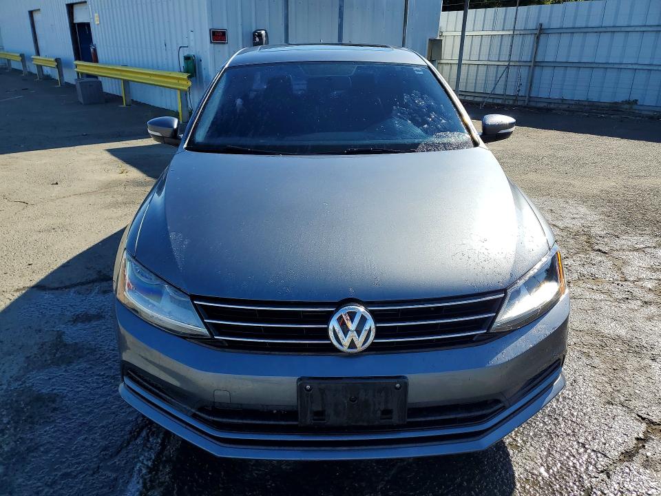 2017 Volkswagen Jetta VIN 3VWDB7AJ9HM299473 COPART salvage auction — MINOR DENT/SCRATCHES, CA - CERTIFICATE OF TITLE, sold $4,150 on 2026-08-11 (photo 5)