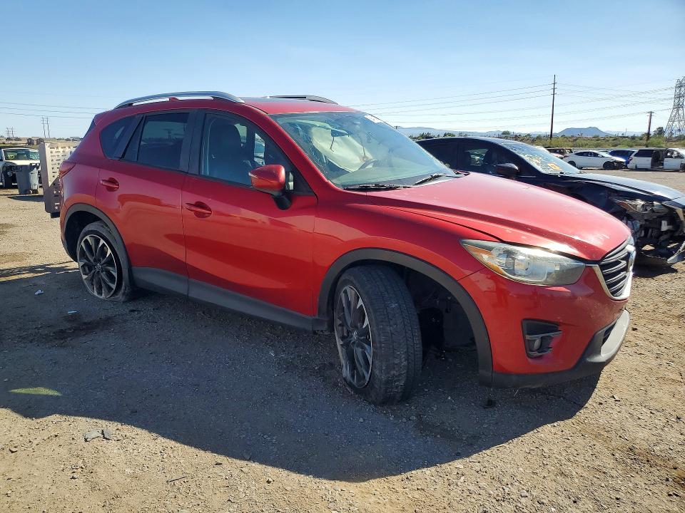 2016 Mazda VIN JM3KE4DY4G0821282 COPART salvage auction — SIDE, Az - Cert Of Title - Salvage, sold $1,650 on 2026-07-06 (photo 4)