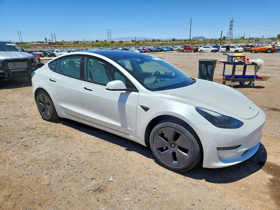 2023 Tesla Model 3 VIN 5YJ3E1EA6PF552040 COPART salvage auction — SIDE, Salvage Title, sold $9,600 on 2026-08-28 (photo 4)