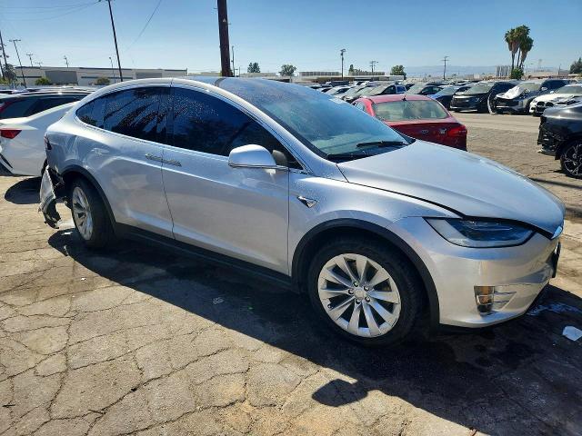 2016 Tesla Model x VIN 5YJXCBE25GF024933 COPART salvage auction — REAR END, CA - CERTIFICATE OF TITLE, sold $6,000 on 2026-07-09 (photo 4)