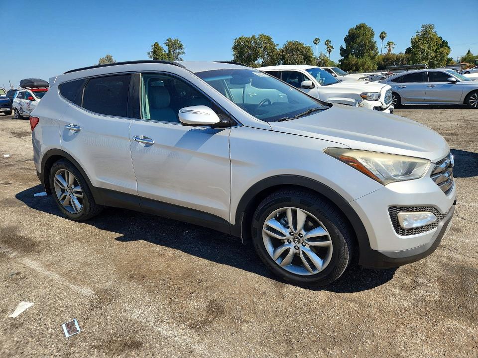 2014 Hyundai Santa fe VIN 5XYZU3LA8EG191542 COPART salvage auction — VANDALISM, Ca - Salvage Certificate, sold $1,750 on 2026-07-31 (photo 4)