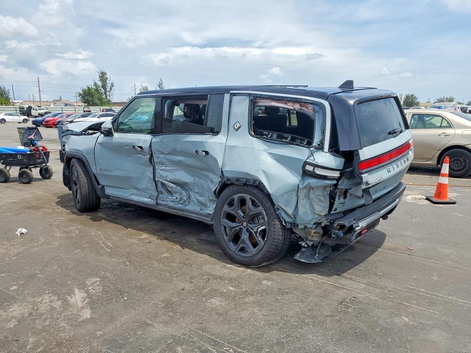 2025 Rivian R1s VIN 7PDSGBBA9SN054322 COPART salvage auction — SIDE, Ks - Cert Of Title-Salvage, sold $10,400 on 2026-07-20 (photo 2)