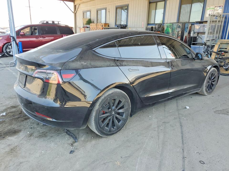 2021 Tesla VIN 5YJ3E1EB9MF089511 COPART salvage auction — VANDALISM, Salvage Title, sold $8,000 on 2026-07-16 (photo 3)