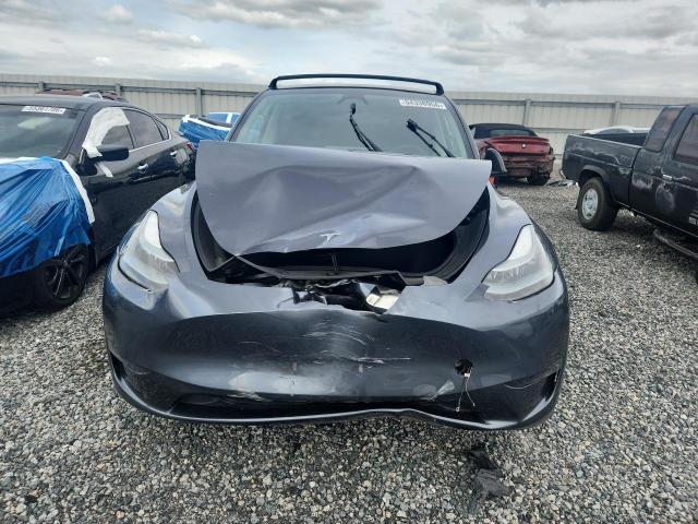 2023 Tesla Model y VIN 7SAYGDEE8PF872287 COPART salvage auction — FRONT END, Fl - Cert Of Title Slvg Rebuildable, sold $12,100 on 2026-07-10 (photo 5)