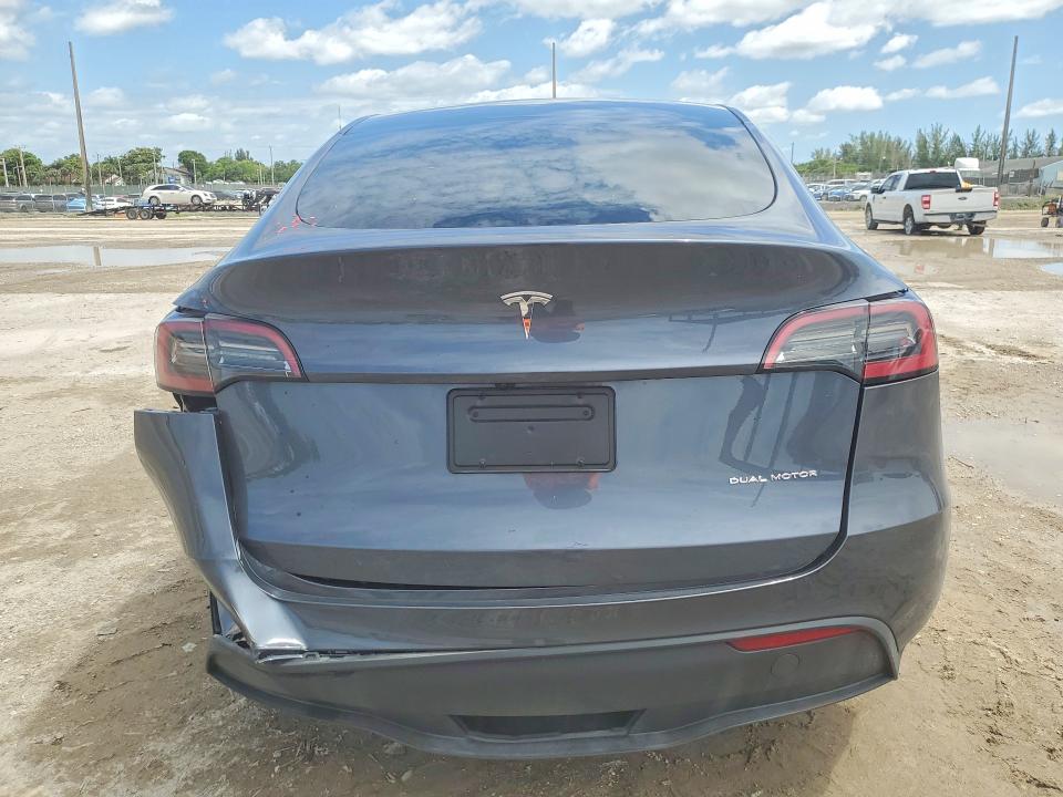 2023 Tesla VIN 7SAYGDEE7PA178199 COPART salvage auction — REAR END, Fl - Cert Of Title Slvg Rebuildable, sold $10,300 on 2026-07-14 (photo 6)