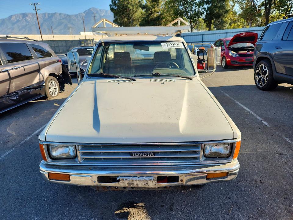 1987 Toyota Pickup VIN JT5RN55T2H7008737 COPART salvage auction — UNDERCARRIAGE, Ca - Dis/Dlr/Exp Only Clean Title, sold $1,400 on 2026-07-14 (photo 5)