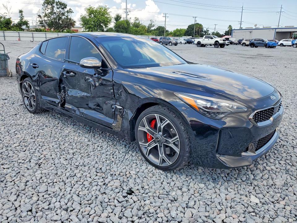 2020 Kia Stinger VIN KNAE45LC1L6081411 COPART salvage auction — SIDE, Fl - Cert Of Title Slvg Rebuildable, sold $8,200 on 2026-08-21 (photo 4)