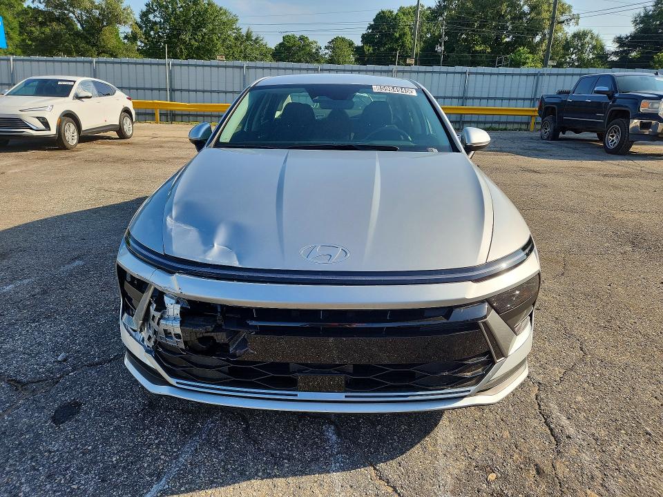 2026 Hyundai Sonata hybrid VIN KMHL24JJ6TA158021 COPART salvage auction — FRONT END, FL - CERTIFICATE OF TITLE, sold $12,700 on 2026-07-13 (photo 5)
