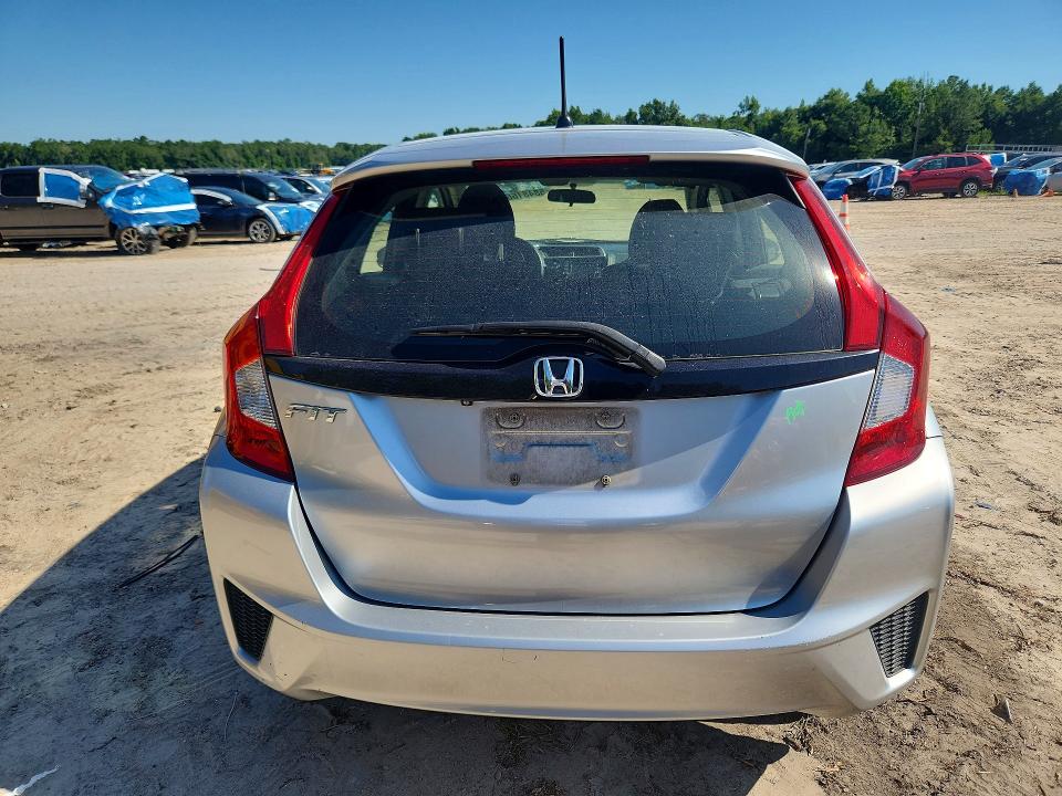 2016 Honda Fit VIN JHMGK5H55GX036739 COPART salvage auction — SIDE, Fl - Cert Of Title Slvg Rebuildable, sold $2,900 on 2026-07-10 (photo 6)