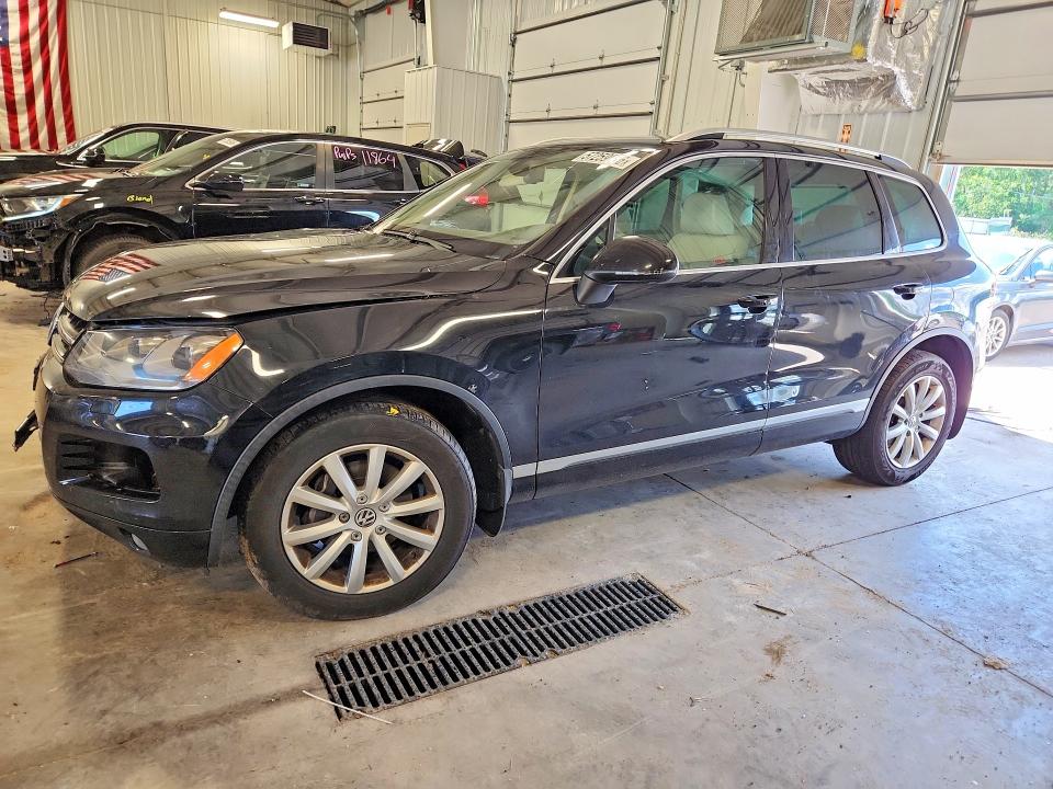 2012 Volkswagen Touareg VIN WVGEK9BPXCD010395 COPART salvage auction — FRONT END, Mn - Cert Of Title-Prior Salvage, sold $675 on 2026-07-09 (photo 1)